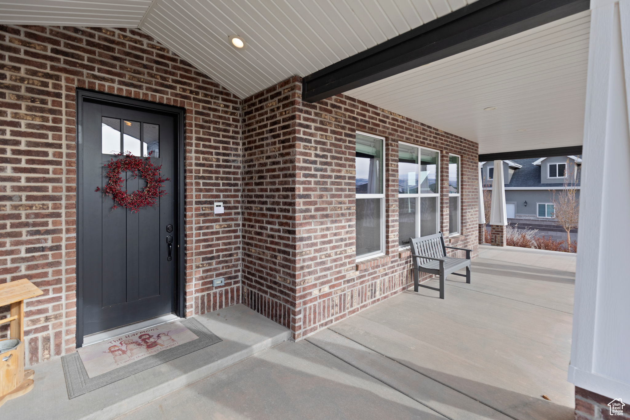 Property entrance with covered porch