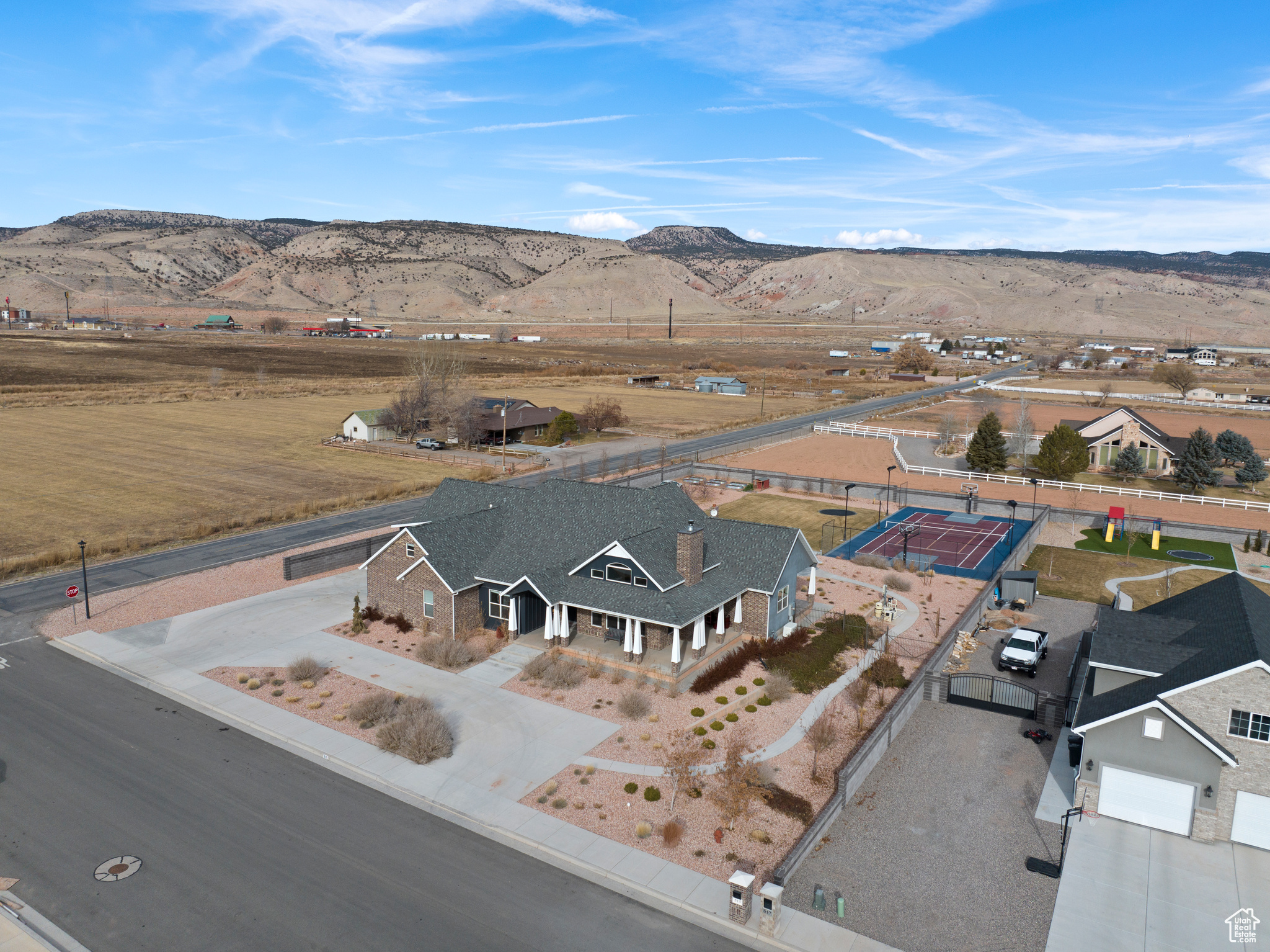 Birds eye view of property with a mountain view