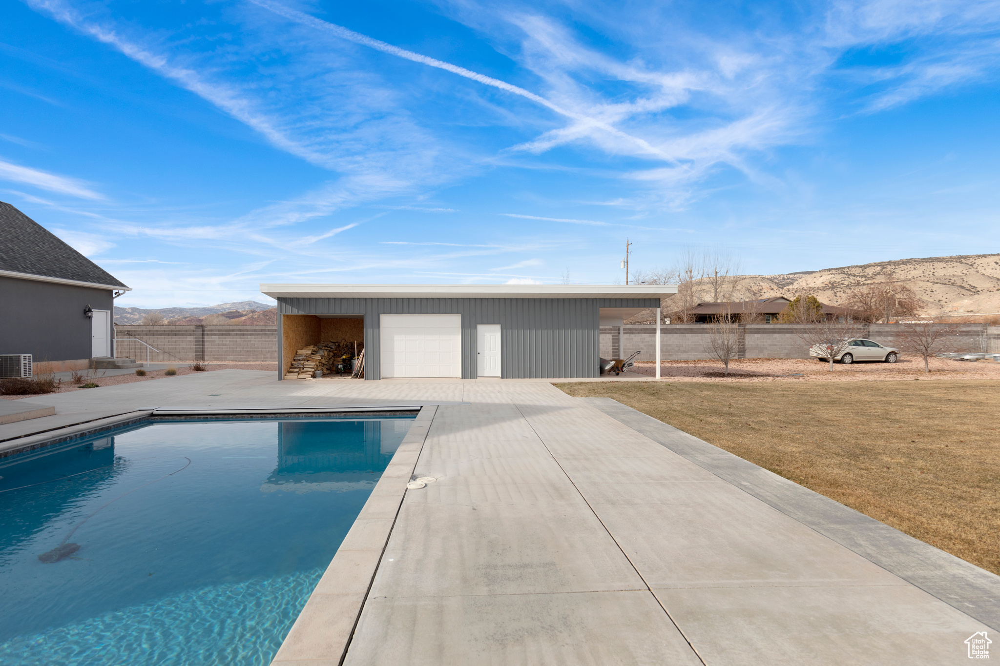 View of pool featuring a patio and an outdoor structure