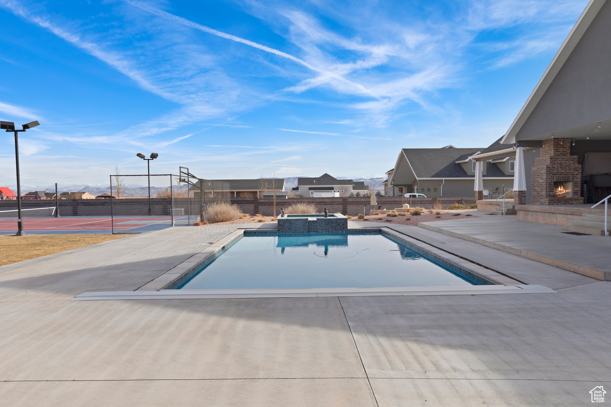 View of swimming pool with a patio