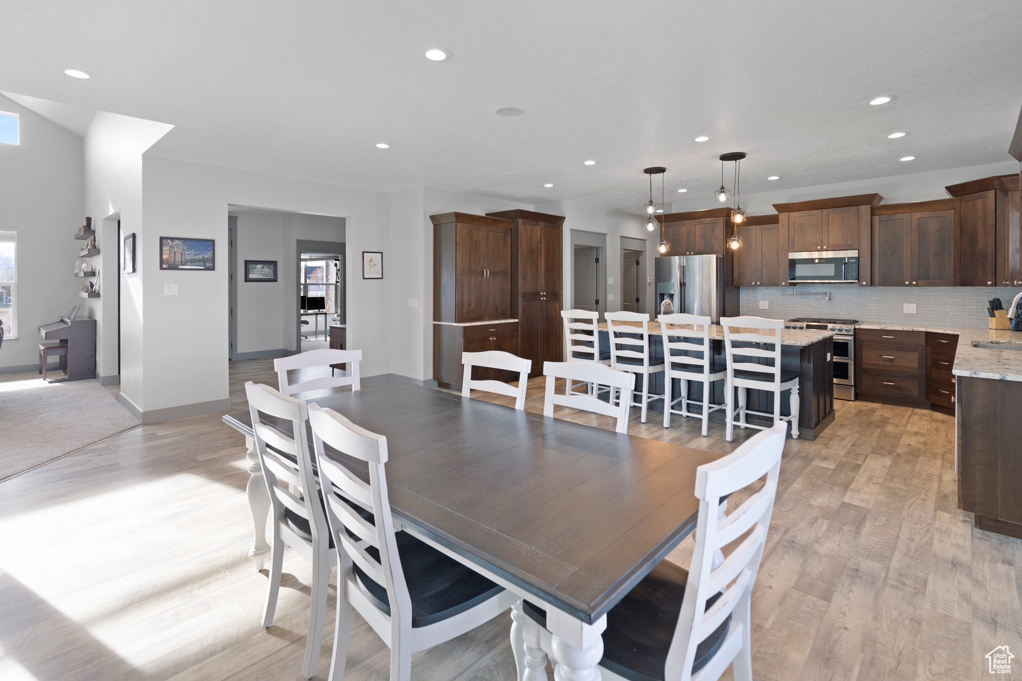 Dining room with light hardwood / wood-style floors