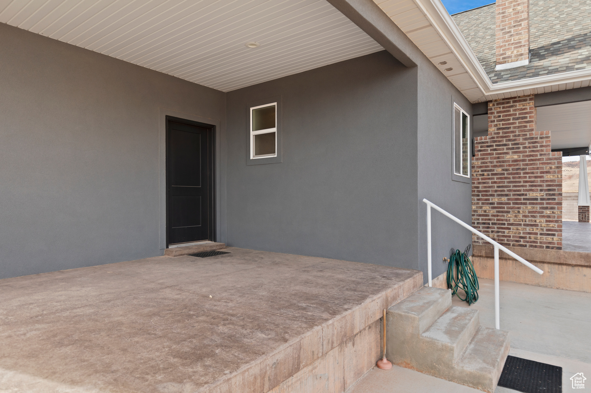 Exterior space with a patio with door to master bedroom