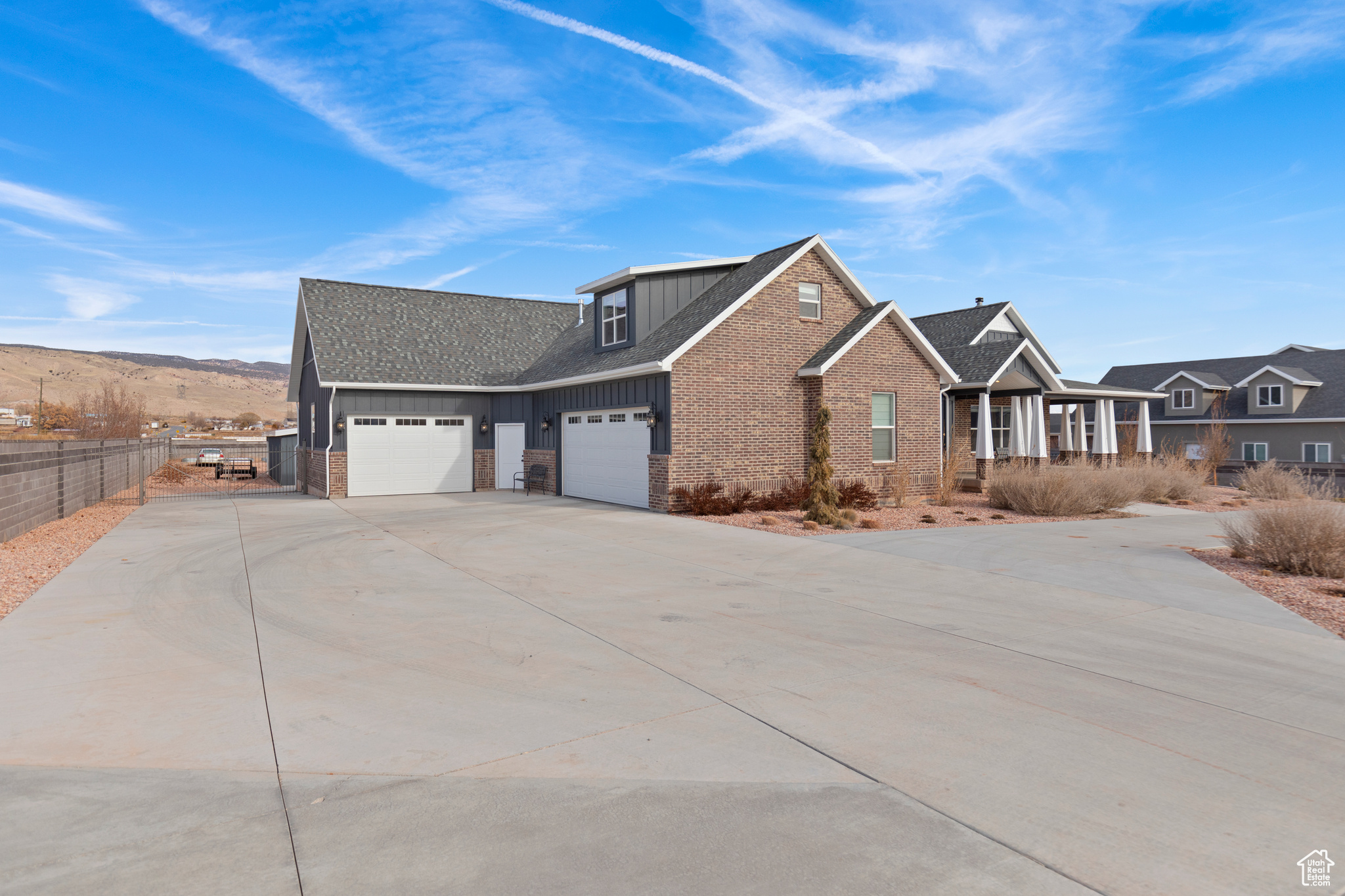 View of front of property with a garage