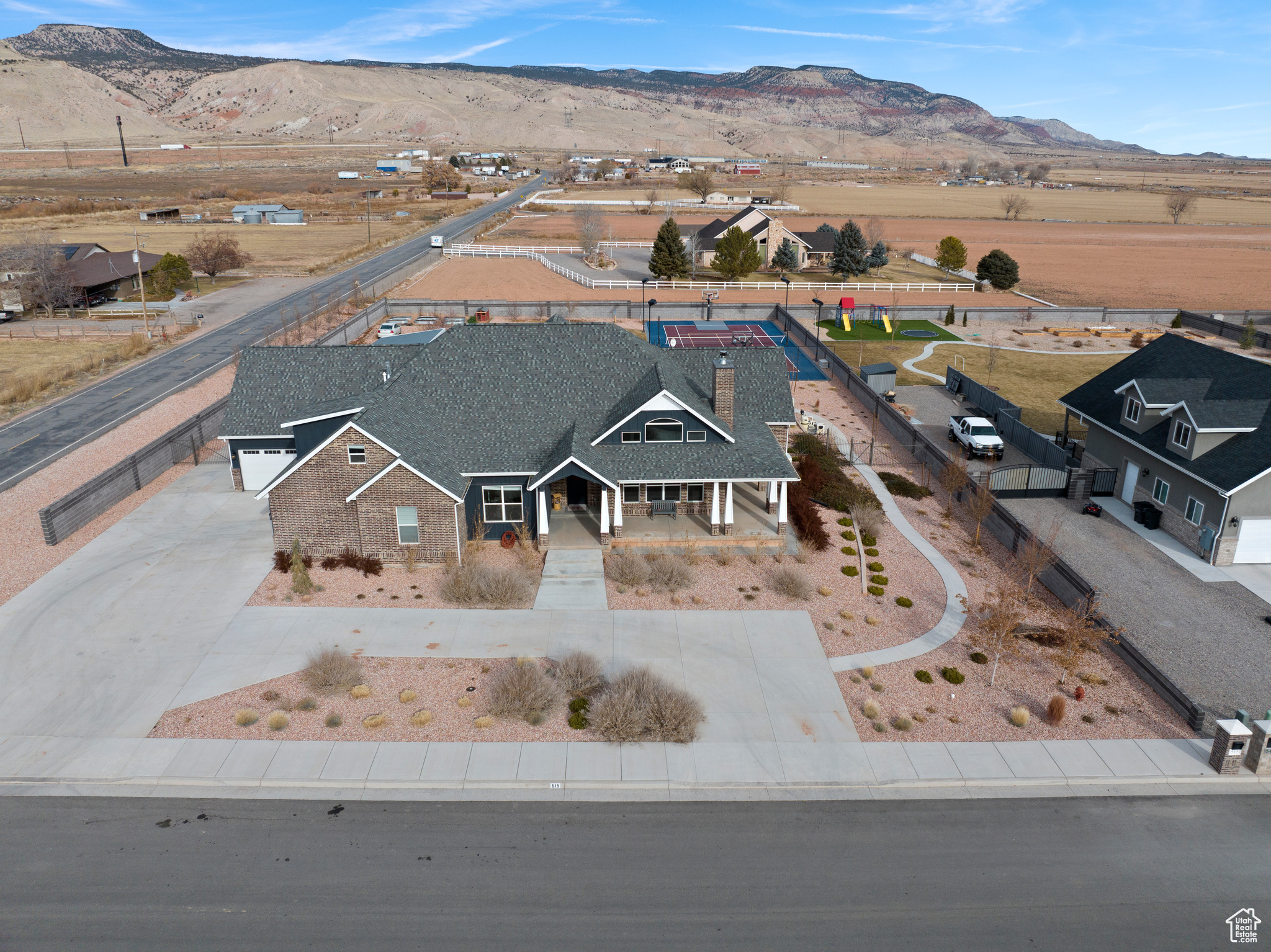 Birds eye view of property with a mountain view