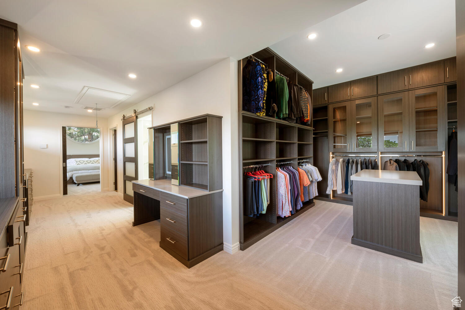 Master closet with pull down access to upper levels 1