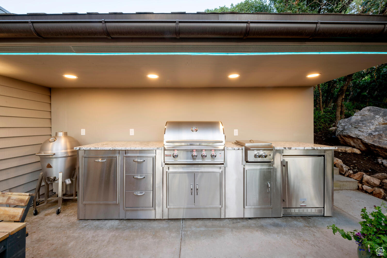 View of outdoor kitchen w/insulated and fire resistant overhang