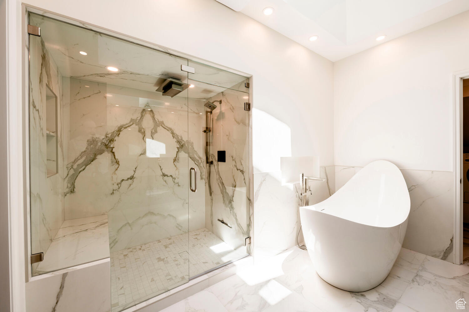 Master bath with separate deep soak tub and shower