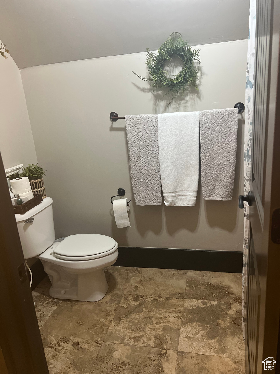 Bathroom with tile floors and toilet