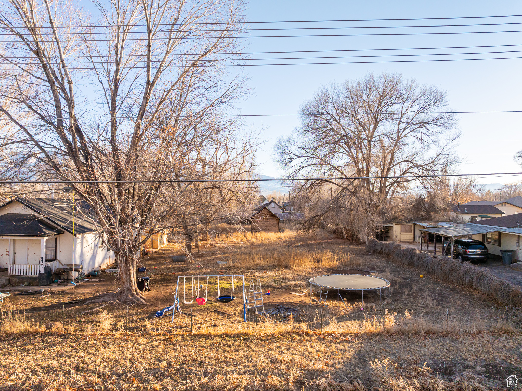 View of yard with a carport