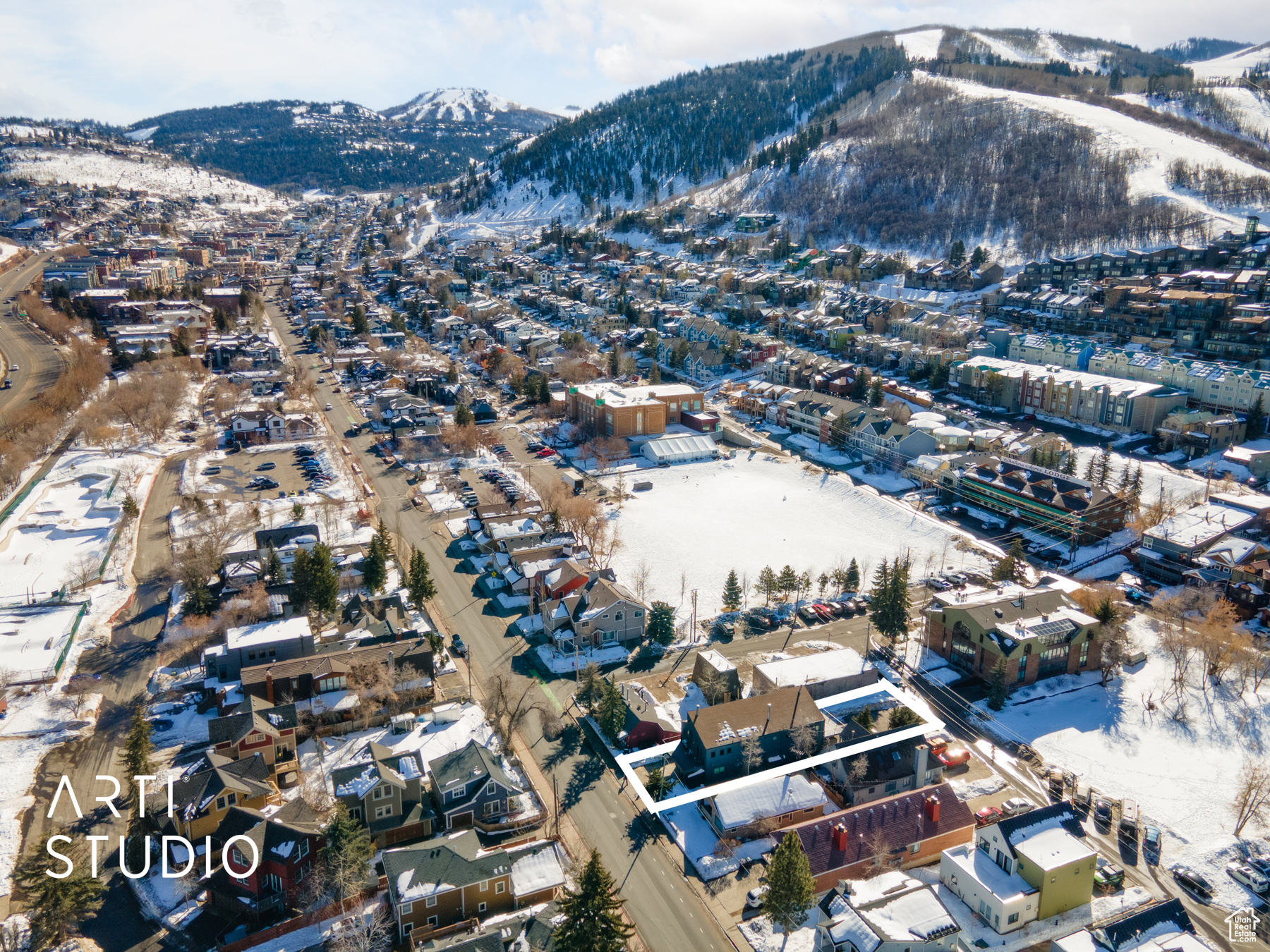 Aerial view featuring mountain views.  Access by Park and Woodside Ave. Location is so close to City Park, City Library, PCMR, Historical Main Street and on bus route