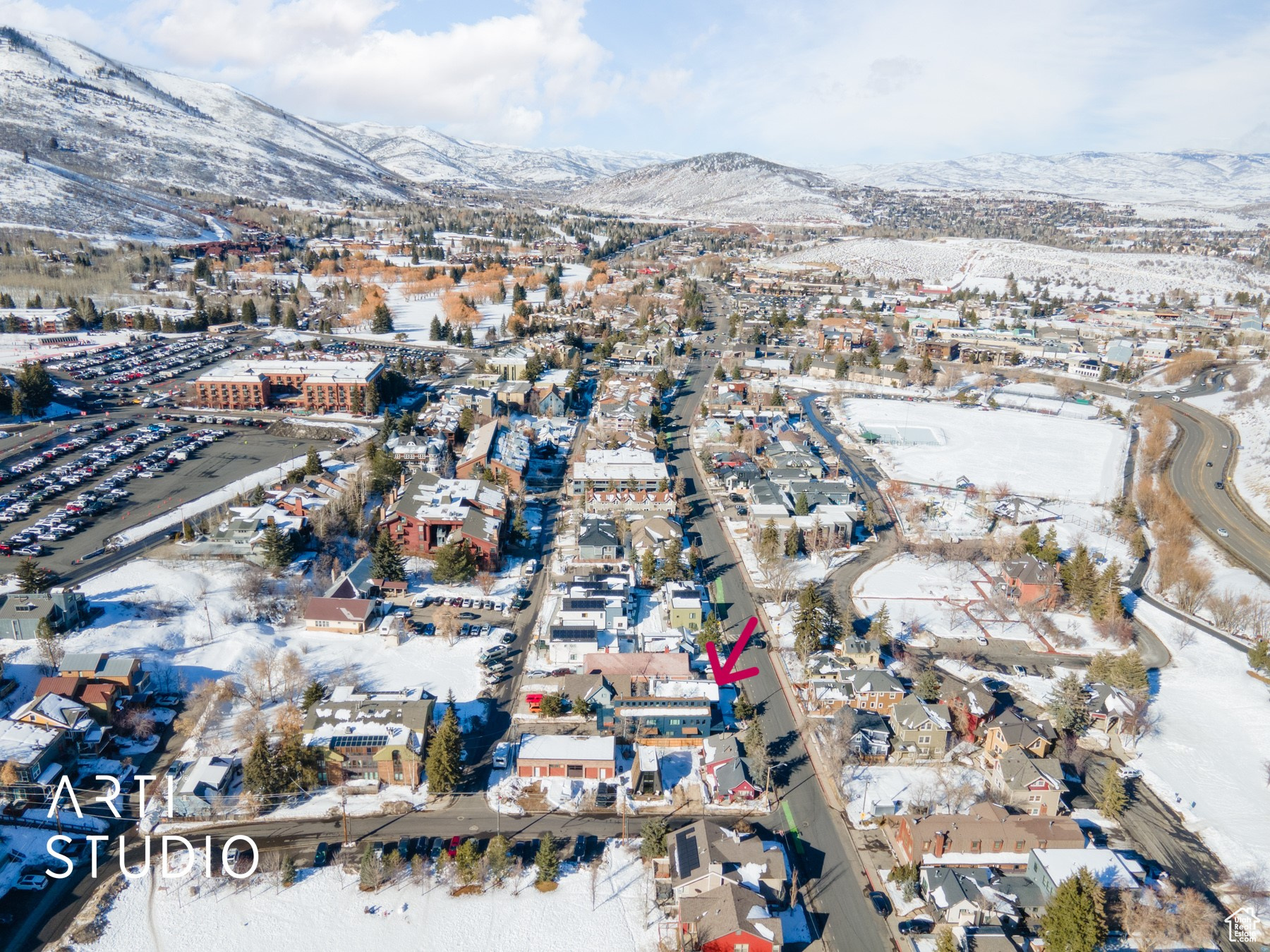 Aerial view featuring mountain views.  Location is so close to City Park, City Library, PCMR, Historical Main Street and on bus route