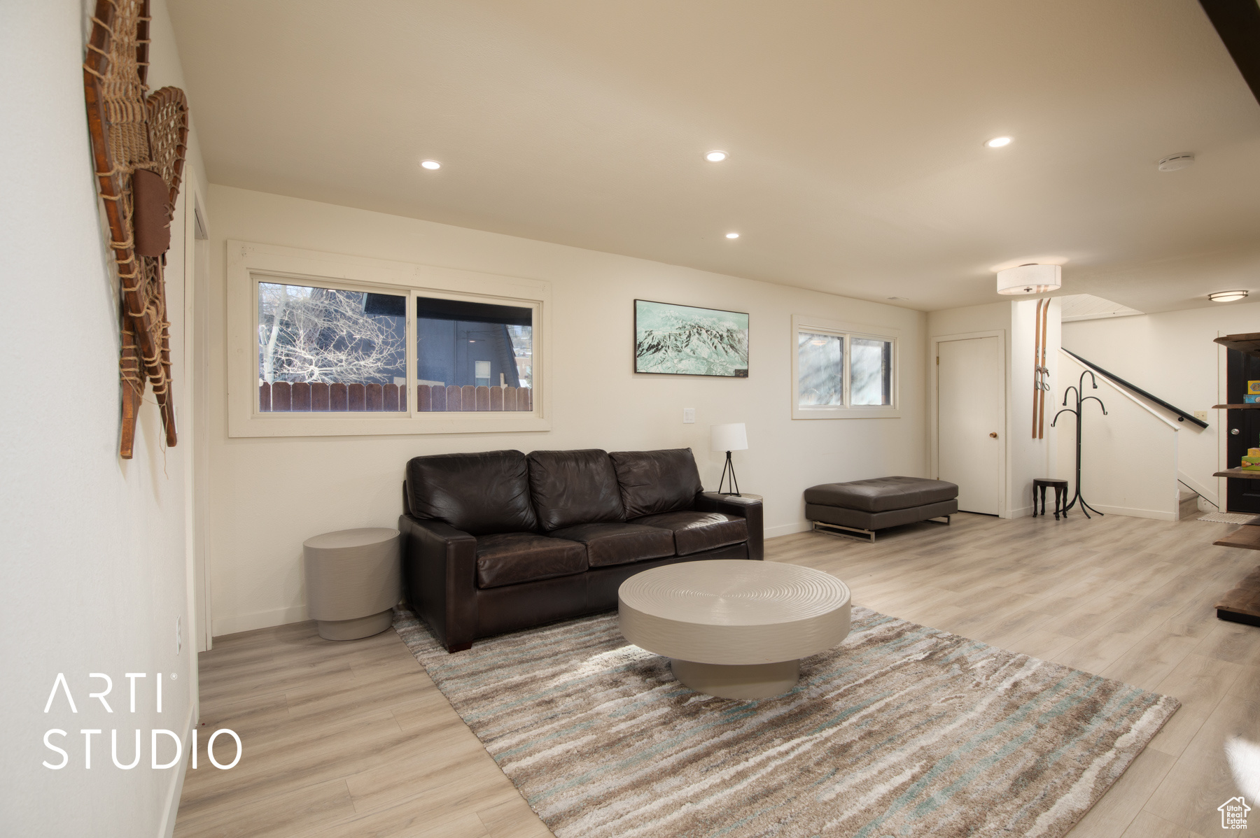 Living room featuring light wood-style flooring