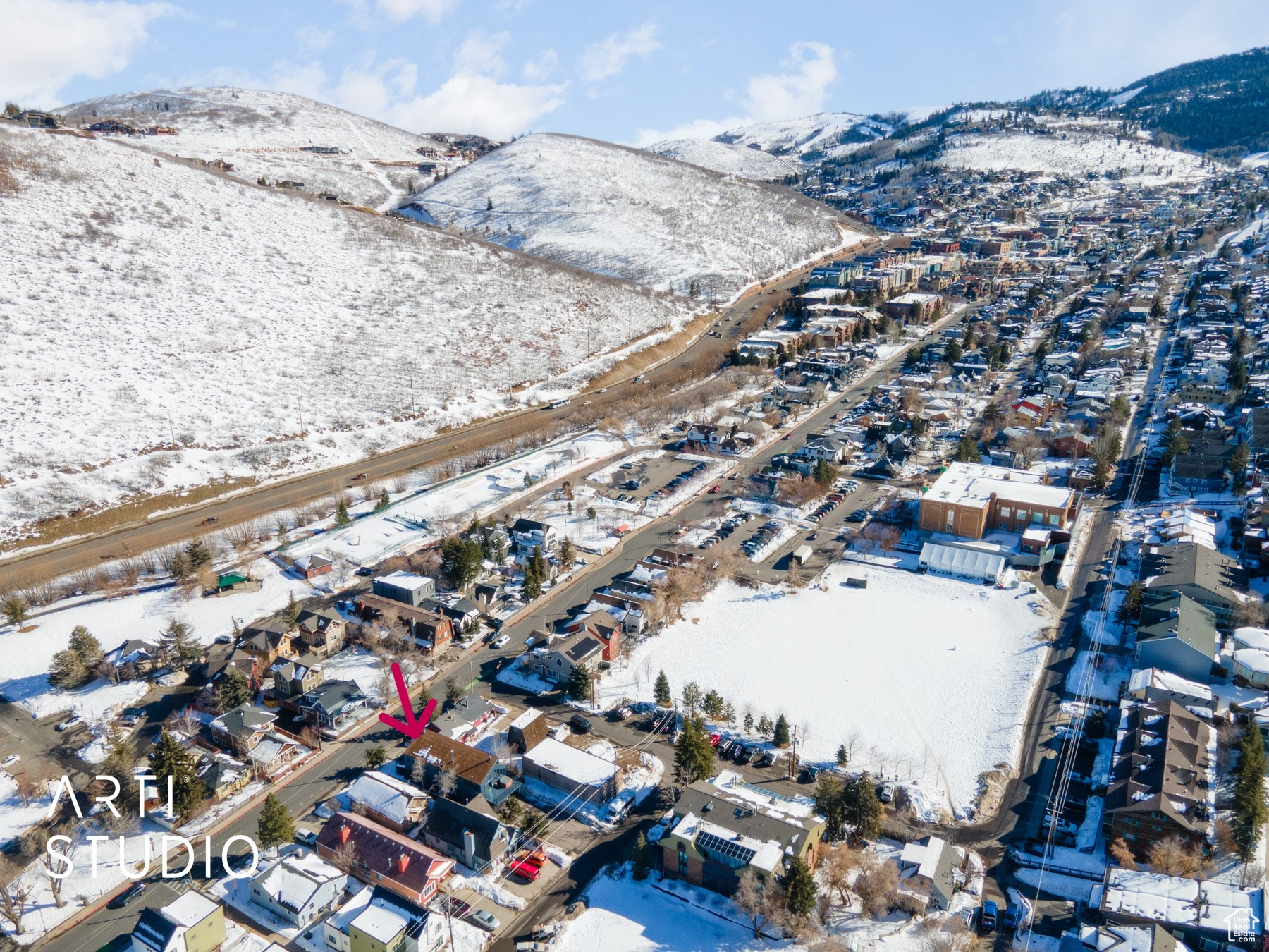 Aerial view featuring mountain views.  Location is so close to City Park, City Library, PCMR, Historical Main Street and on bus route
