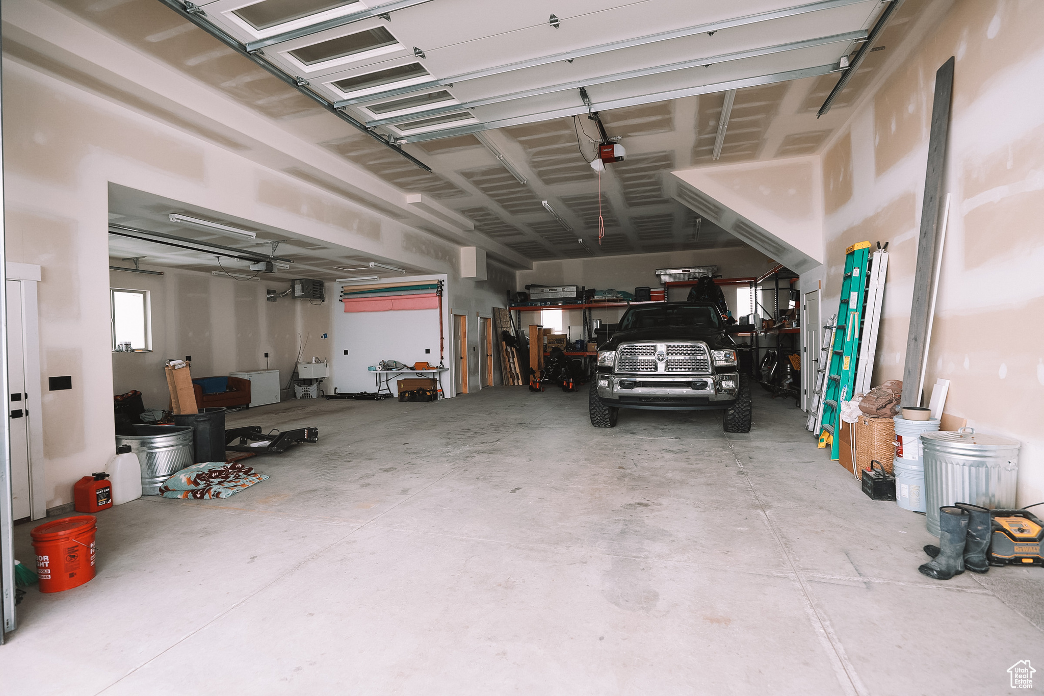 Extensive 5 car garage, wired for a auto lift.