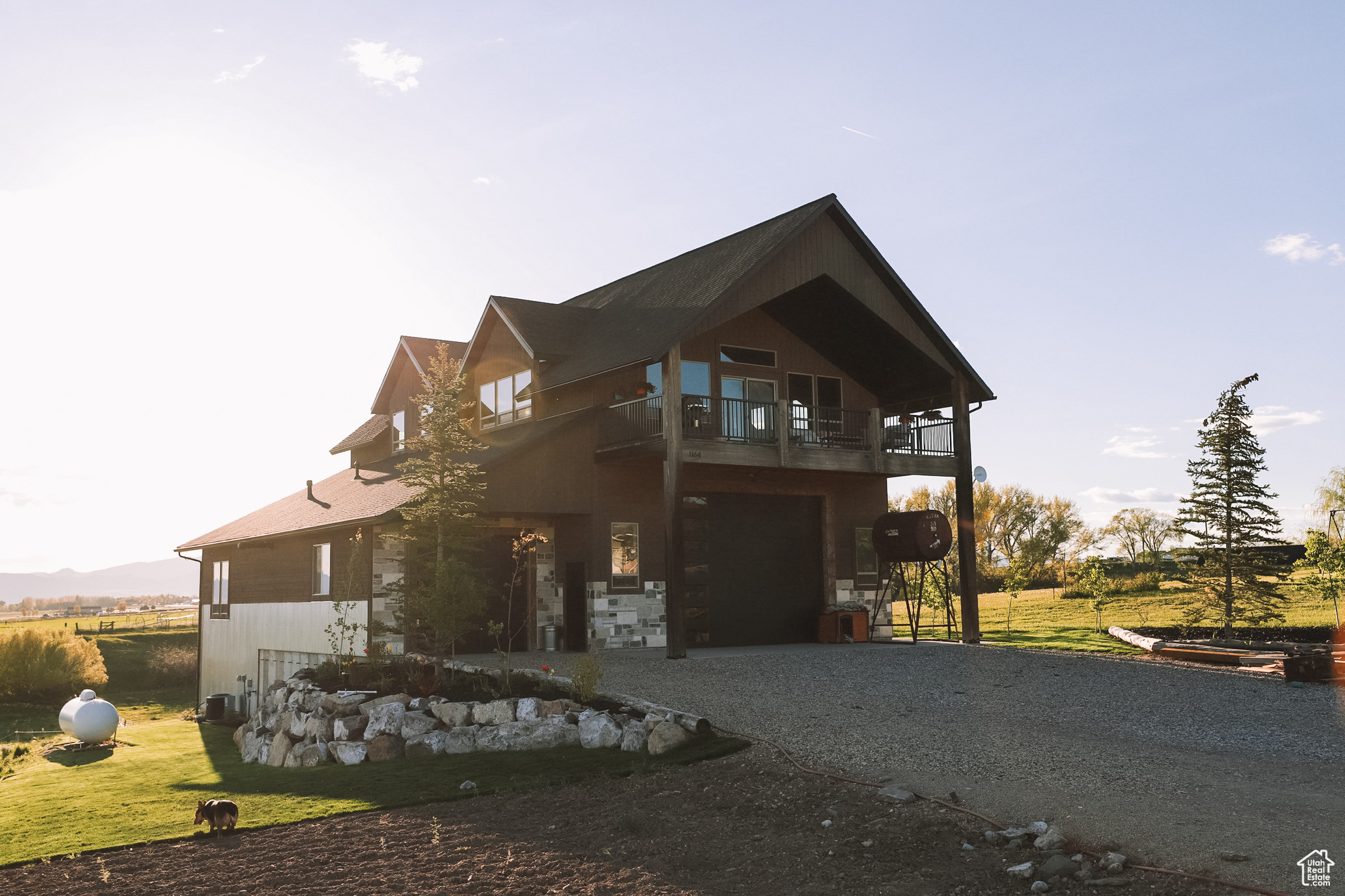 View of front of home featuring a balcony