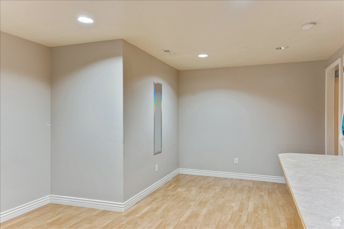 Spare room featuring light hardwood / wood-style floors