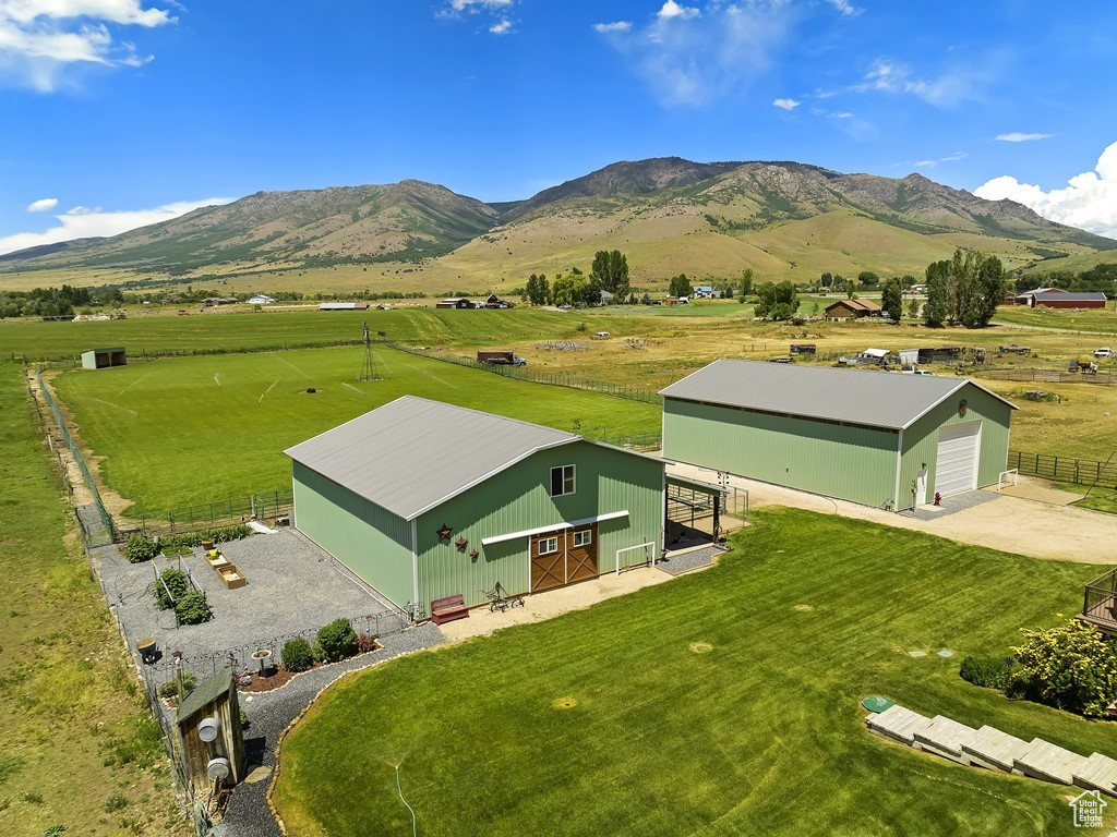 Exterior space featuring a rural view and a mountain view