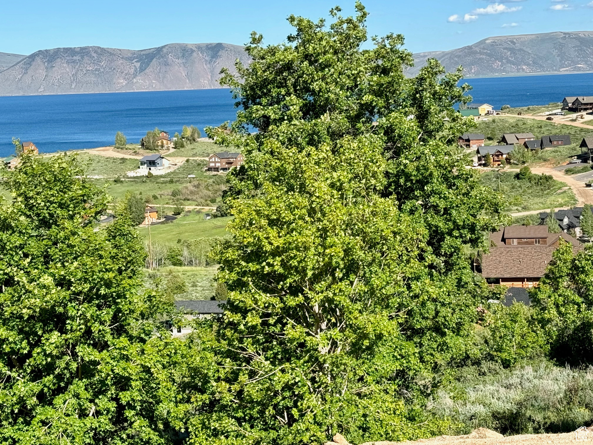 Aerial view with a water and mountain view