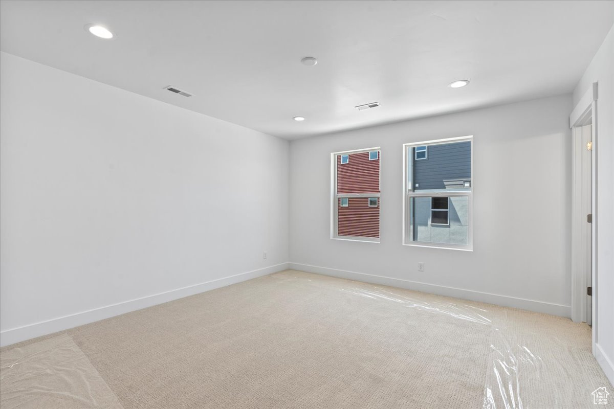 View of carpeted spare room