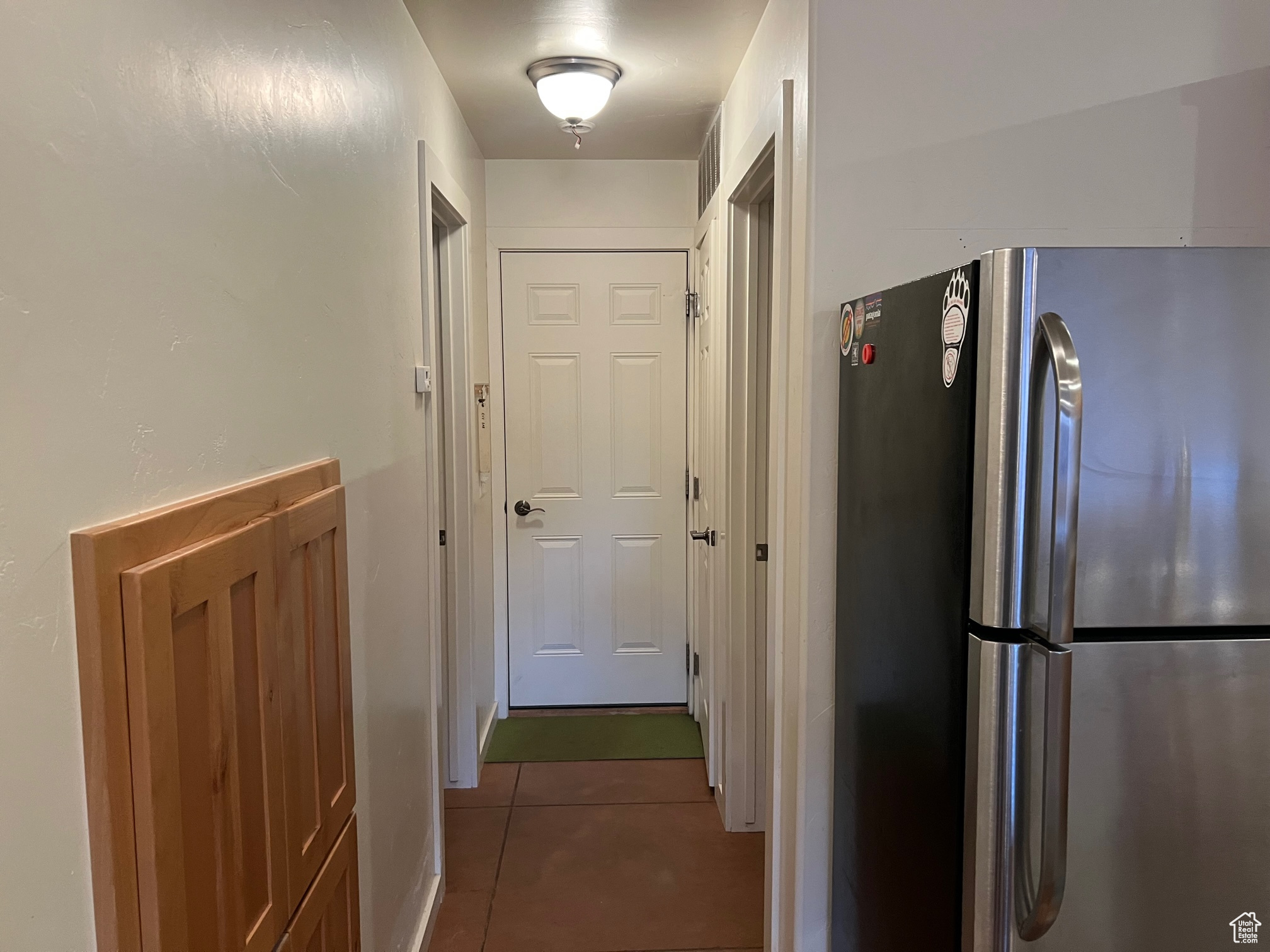 Corridor to bath, laundry and garage