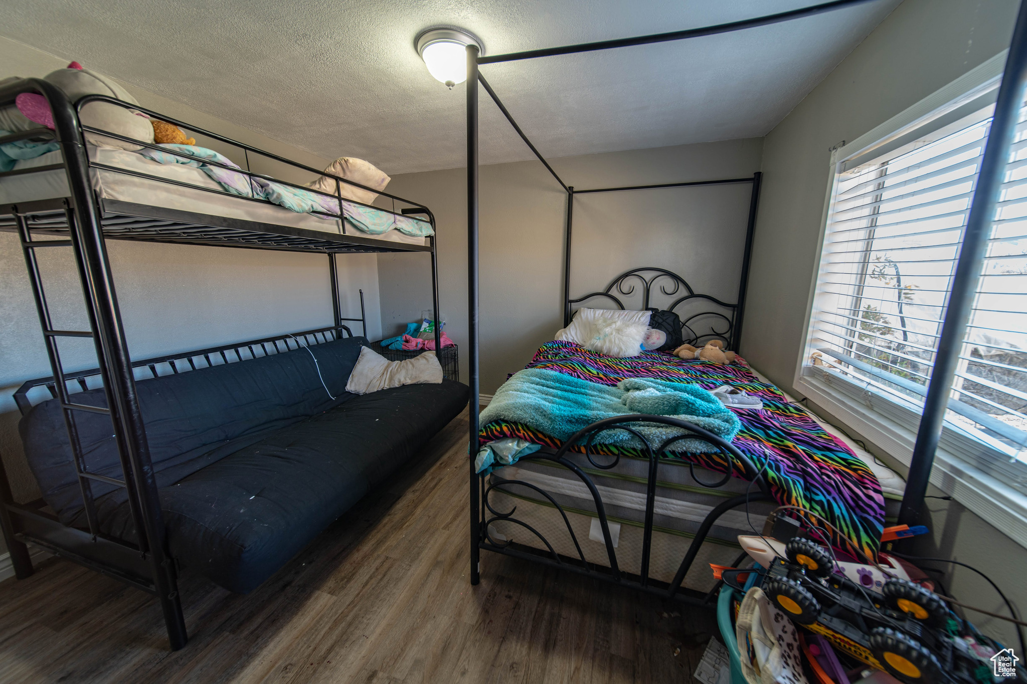 Bedroom featuring hardwood / wood-style flooring