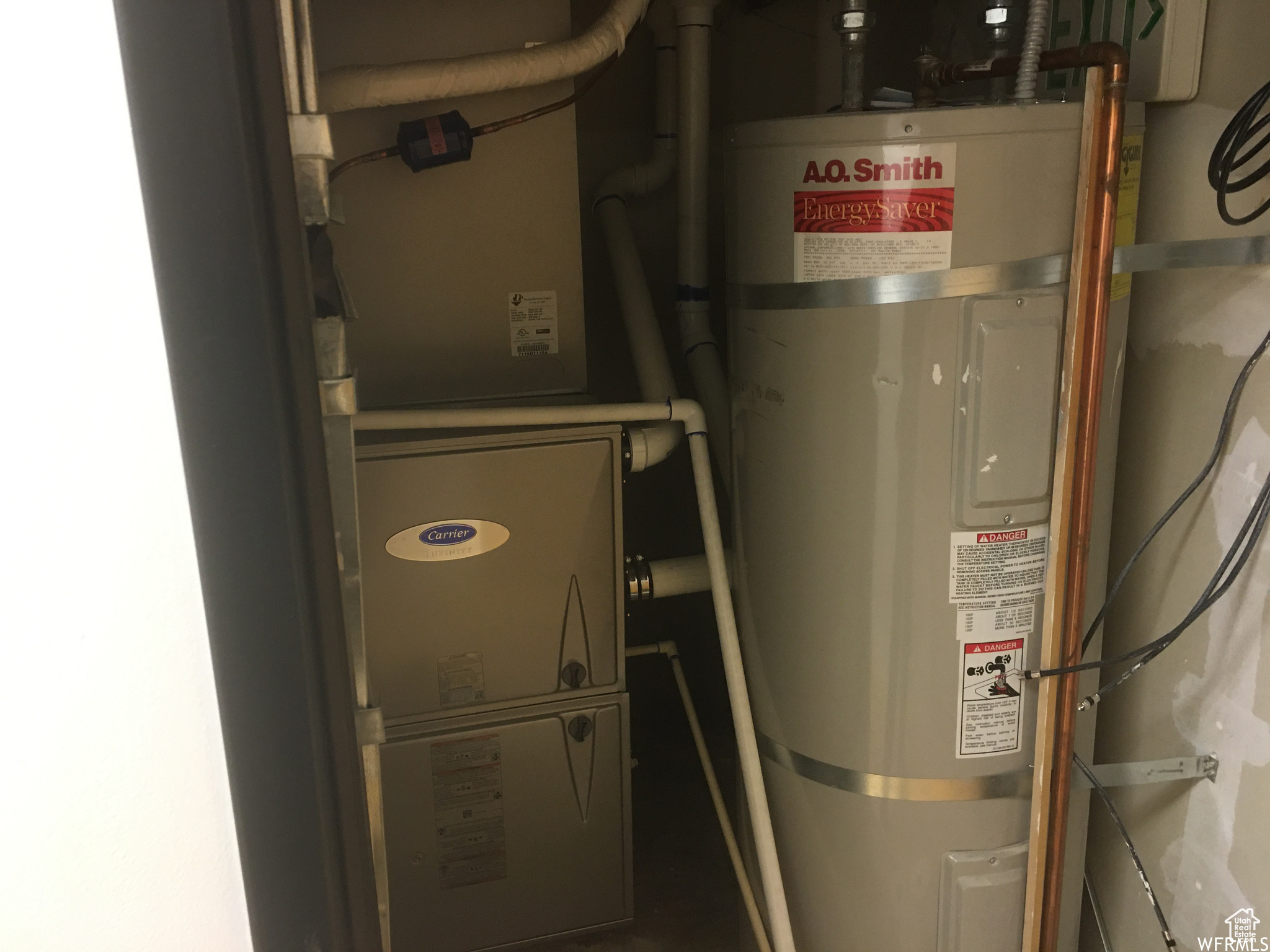 Utility room with electric water heater