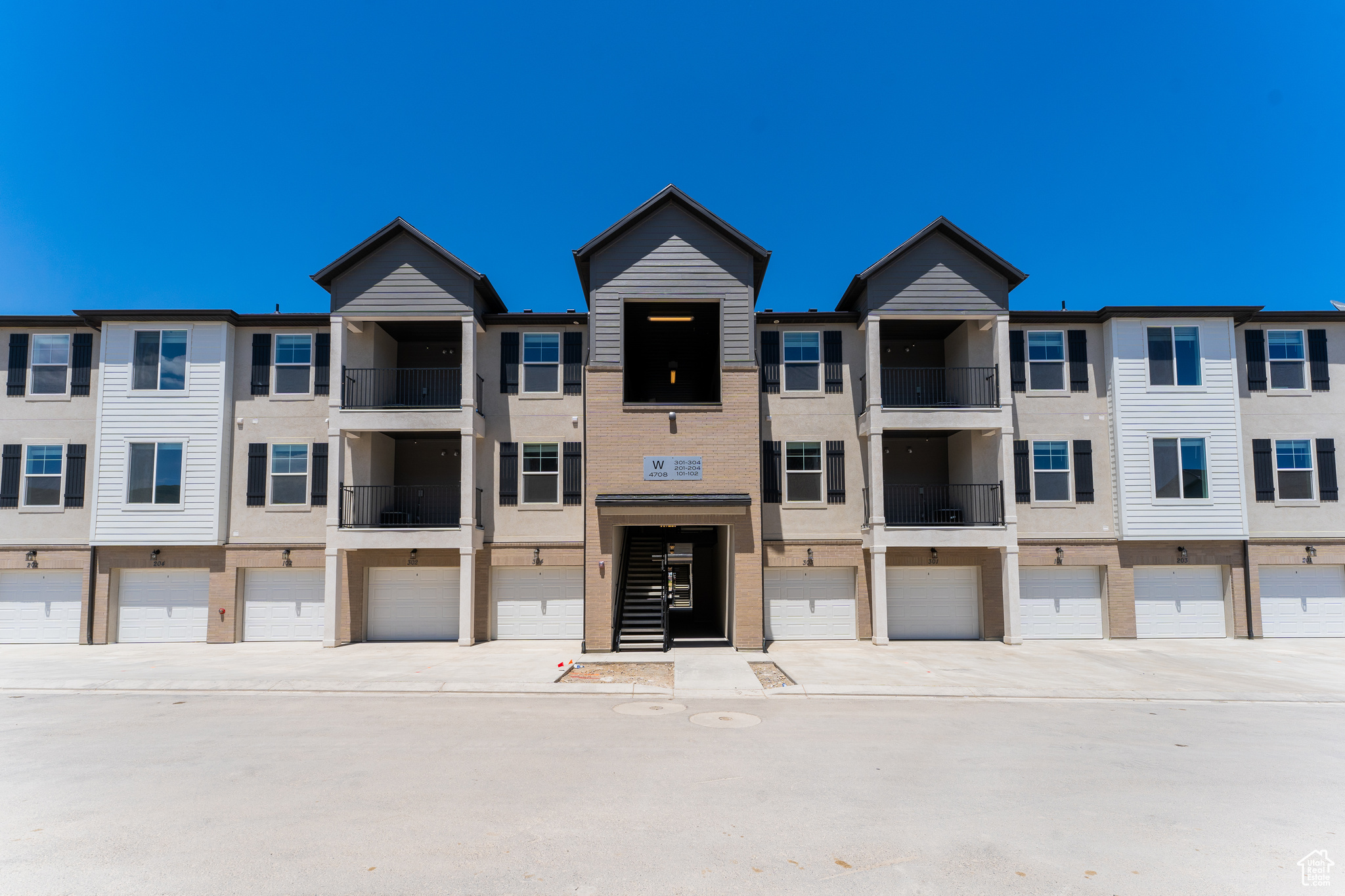 View of building exterior with a garage