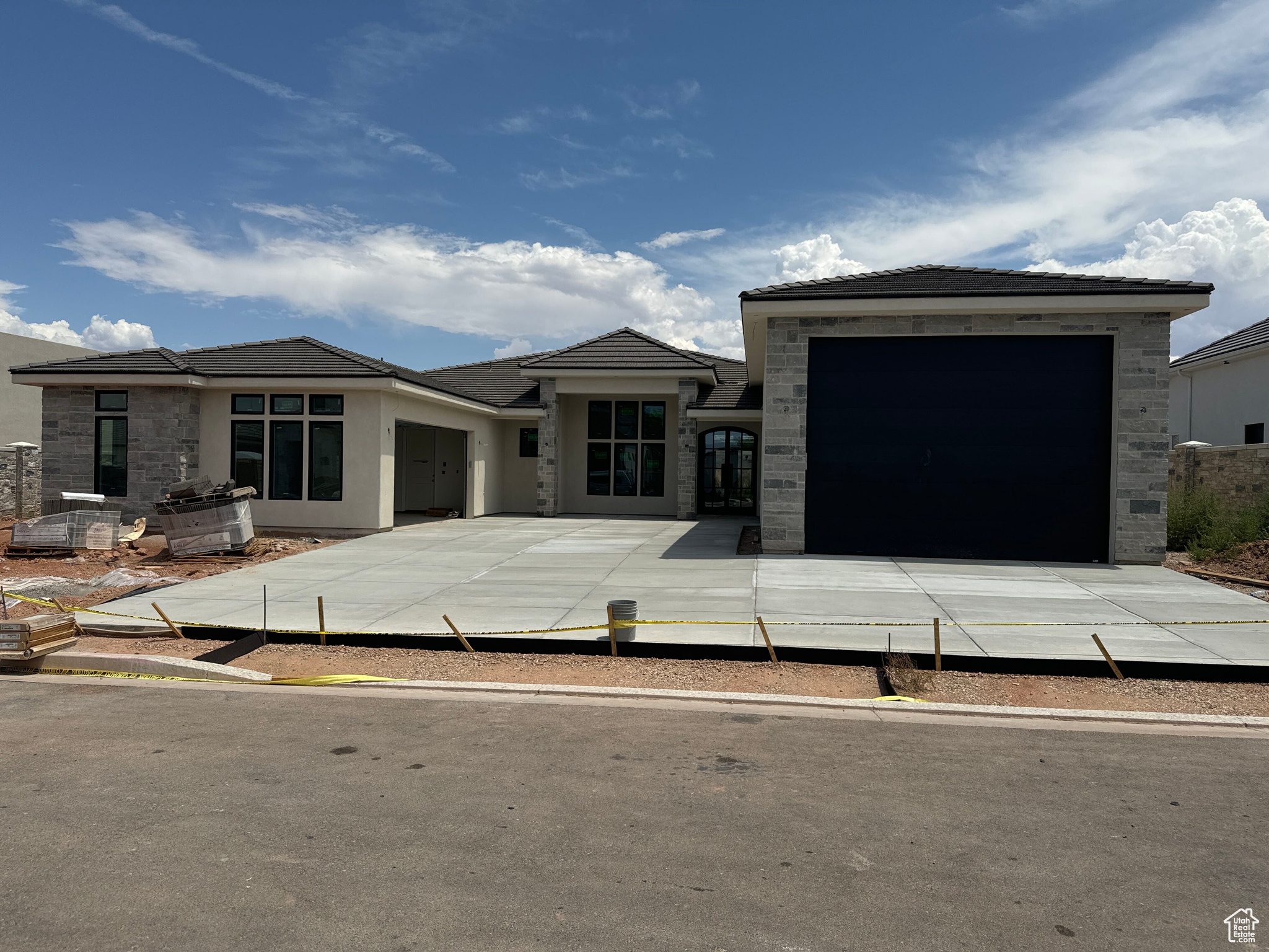 View of front of property featuring a garage