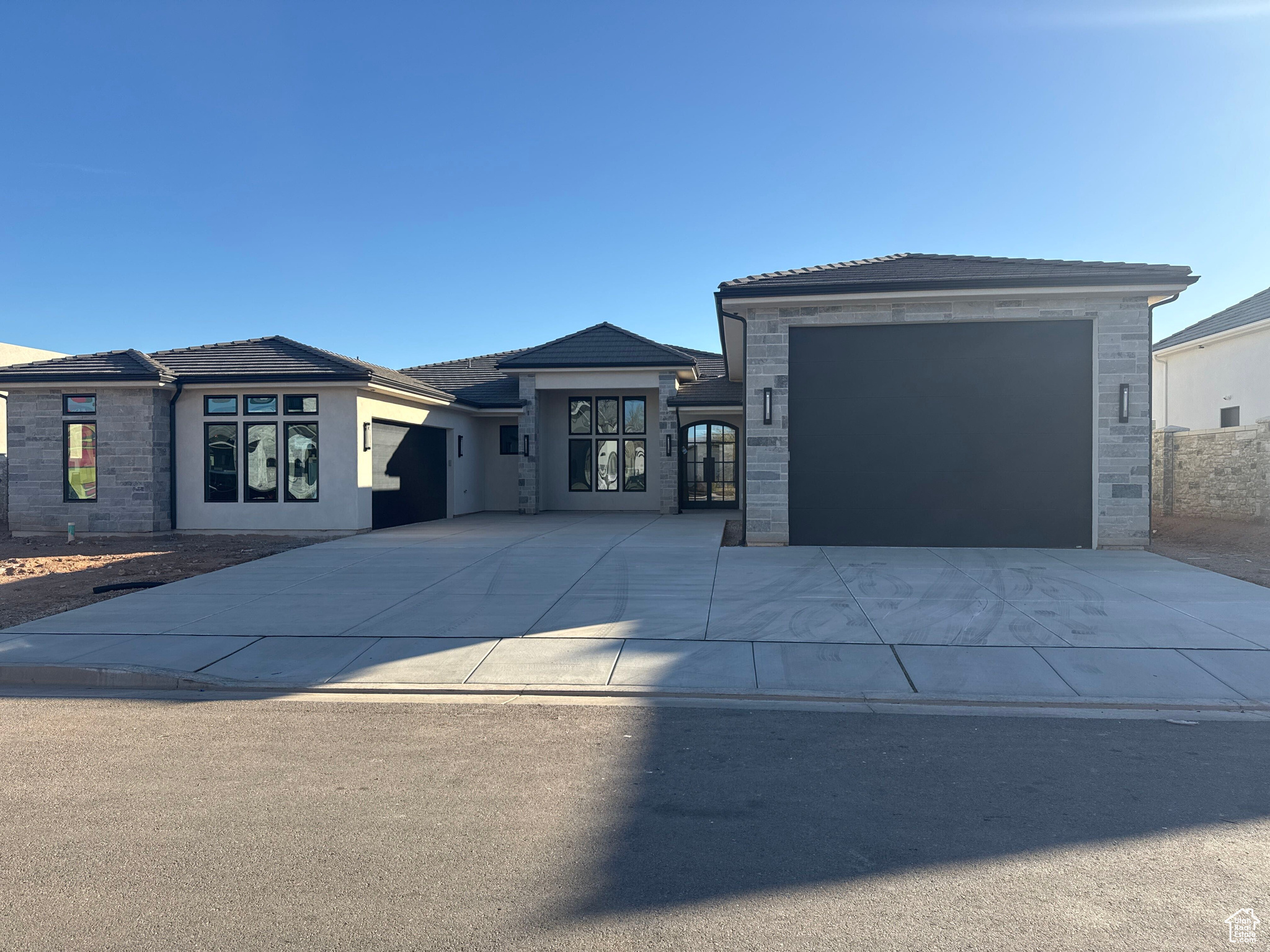 Prairie-style house featuring a garage