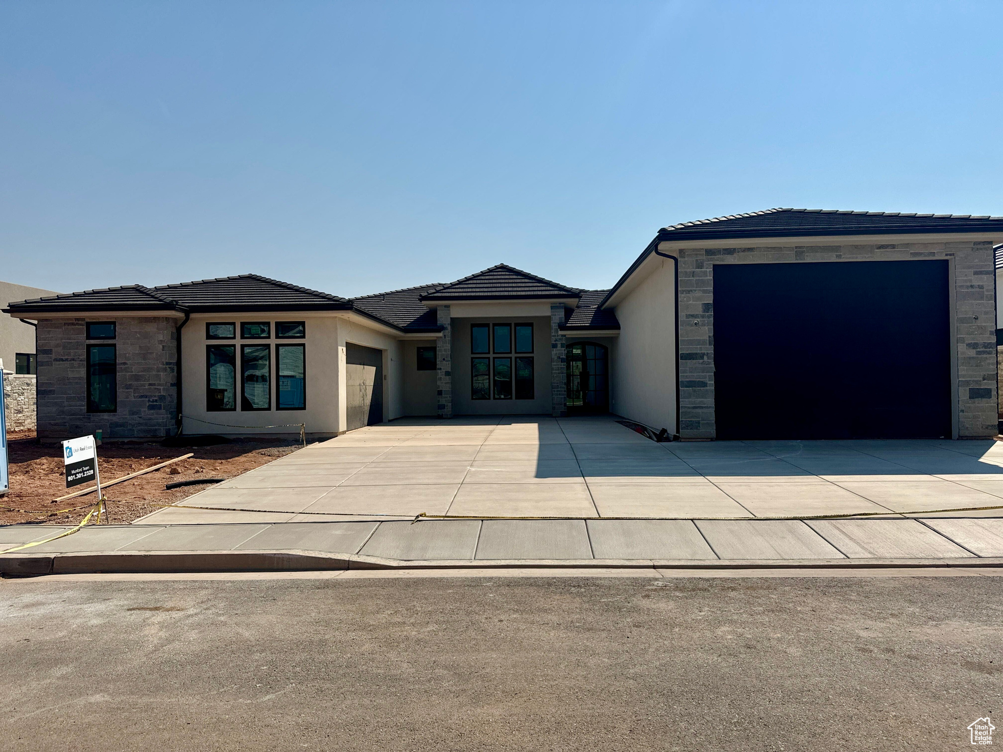 View of front of home featuring a garage