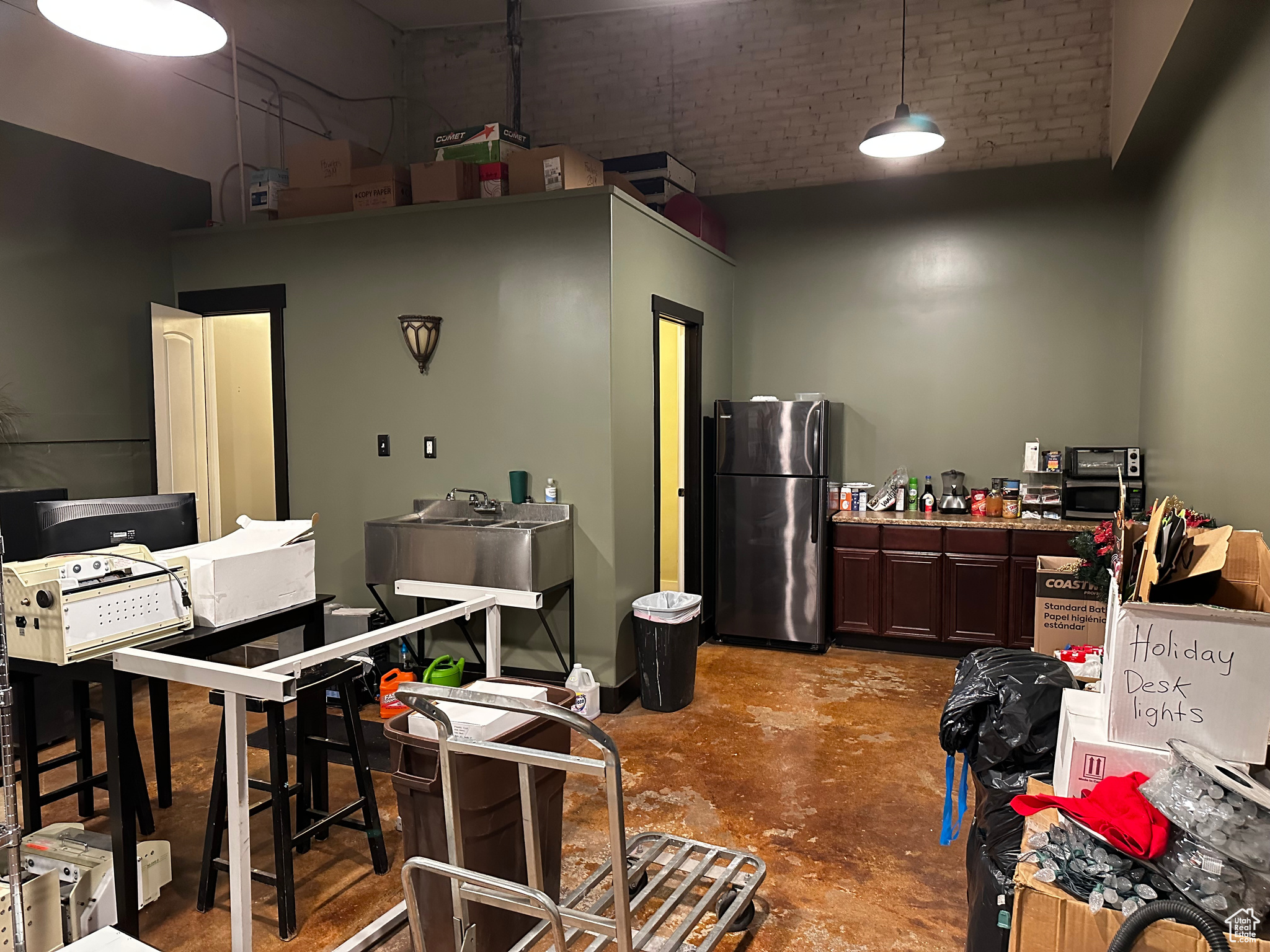 Employee kitchen, two baths and conference area