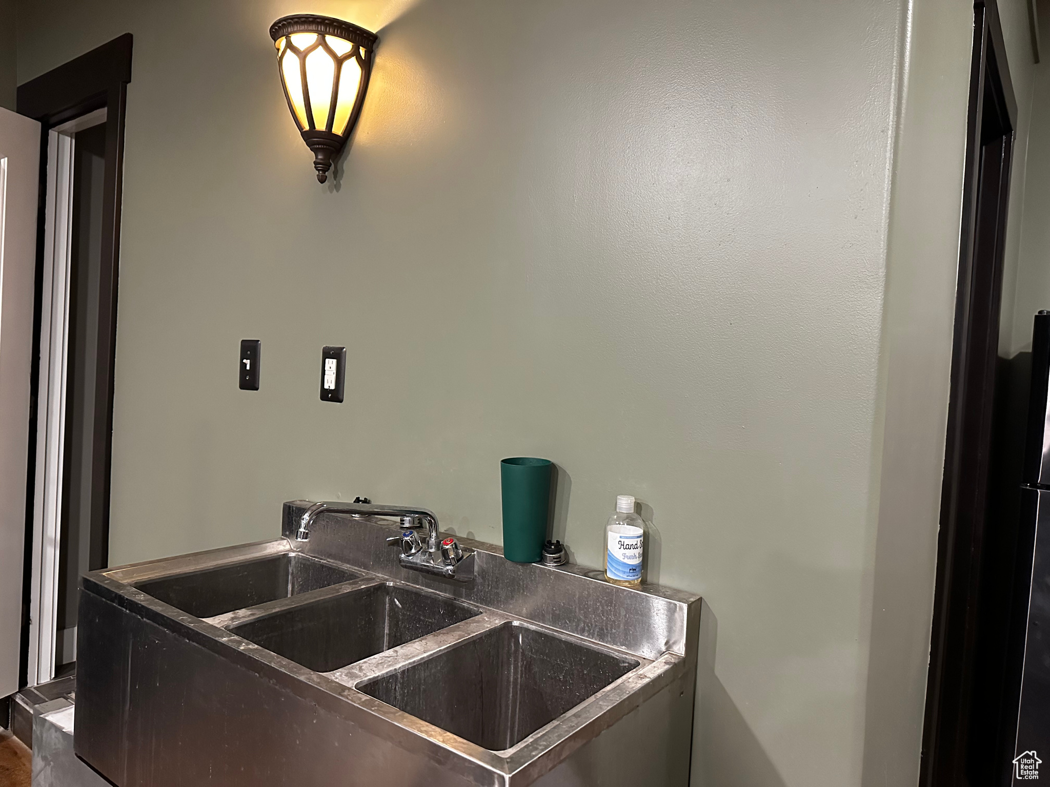 Sink between two bathrooms