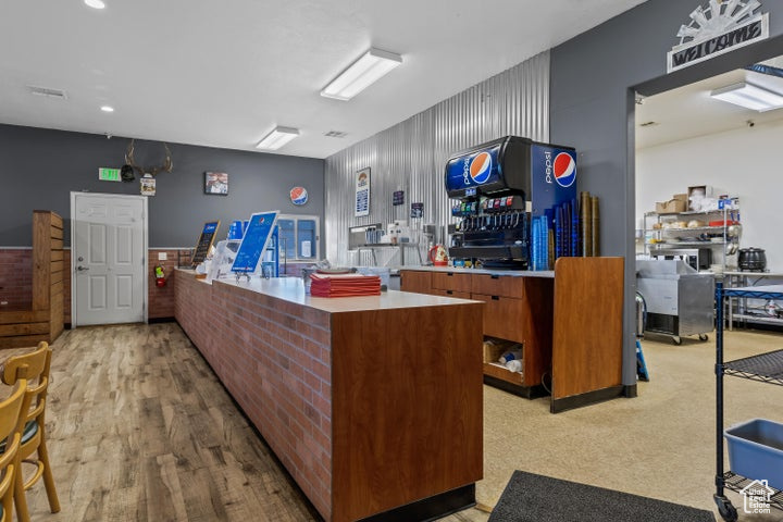 Kitchen featuring light hardwood / wood-style flooring