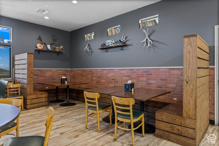 Dining space featuring light hardwood / wood-style floors