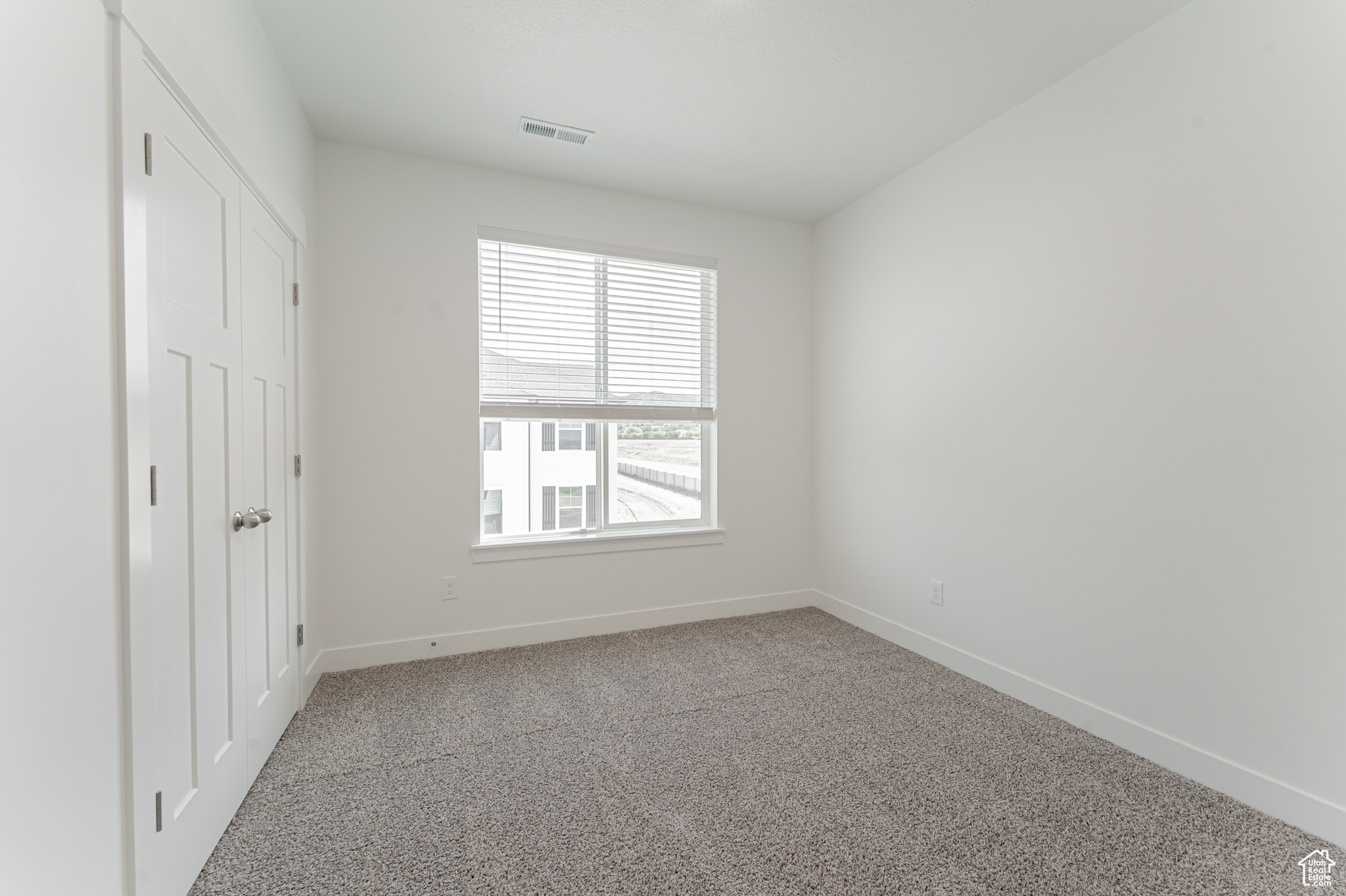 Interior space featuring carpet floors