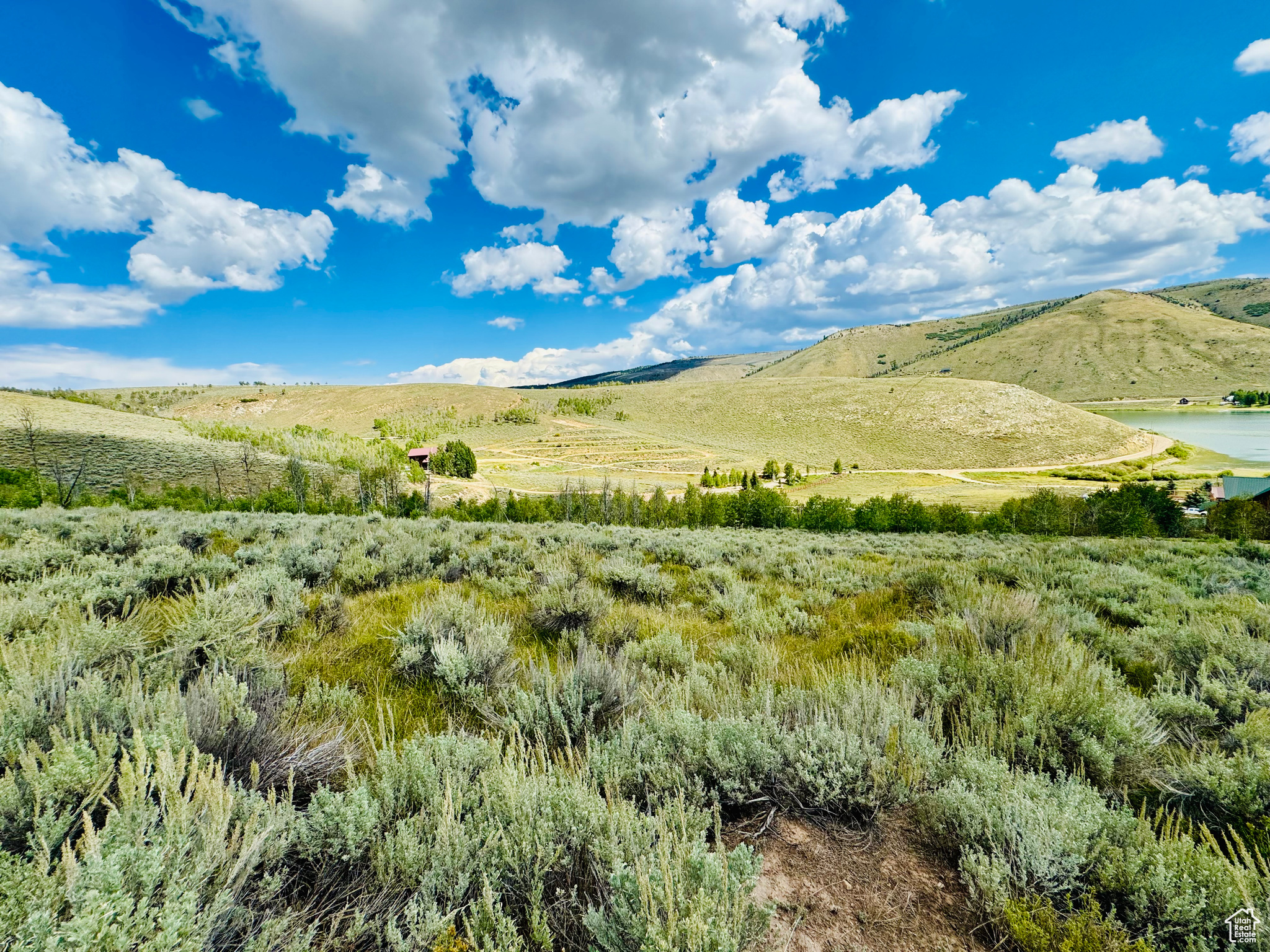 View of mountain feature featuring a rural view and a water view