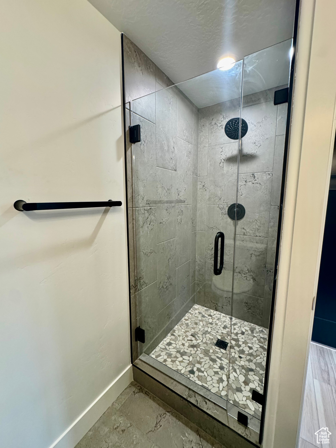 Bathroom featuring walk in shower