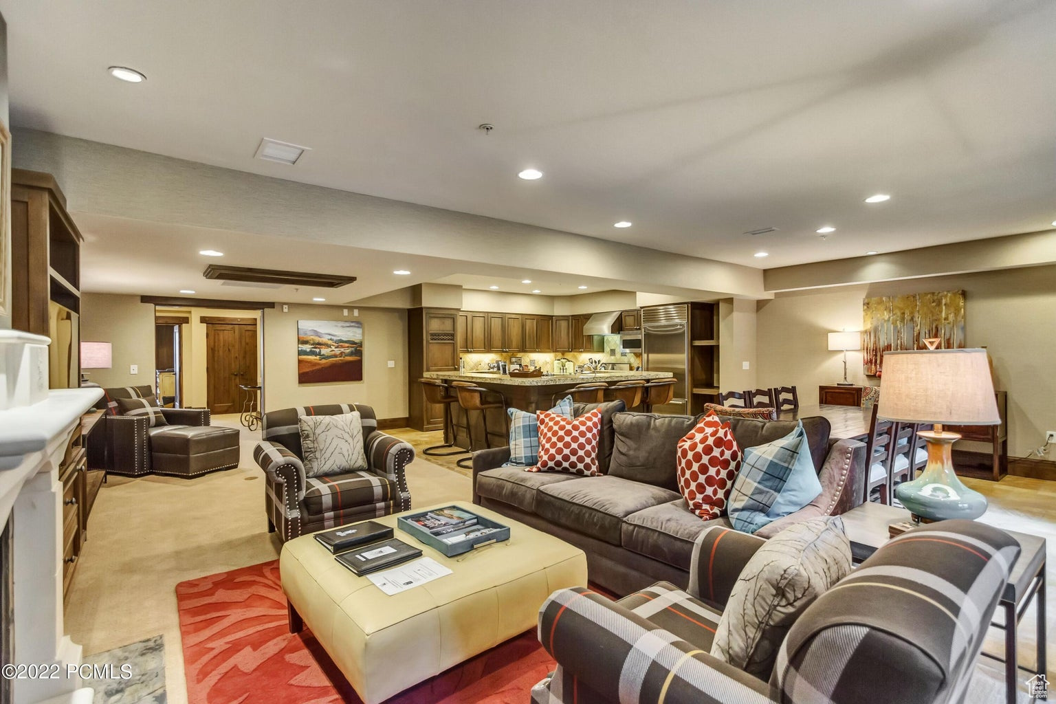 Living room featuring light carpet