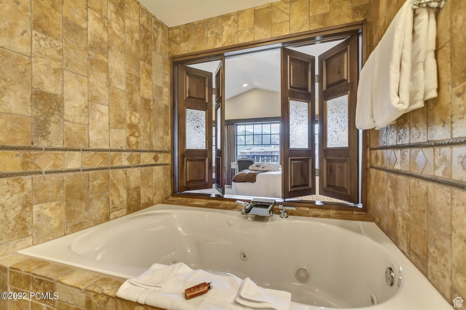 Bathroom featuring lofted ceiling