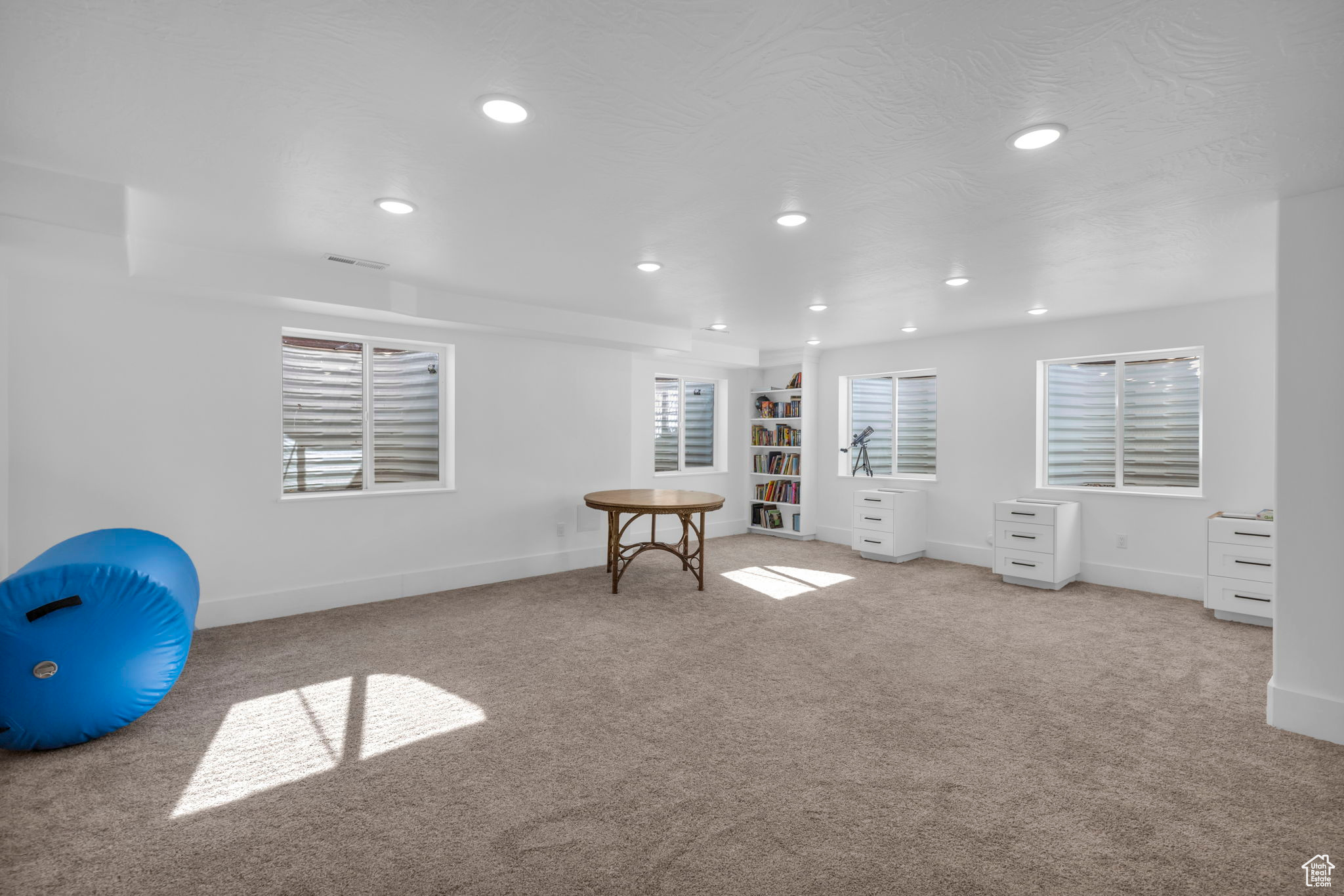 Interior space featuring light carpet