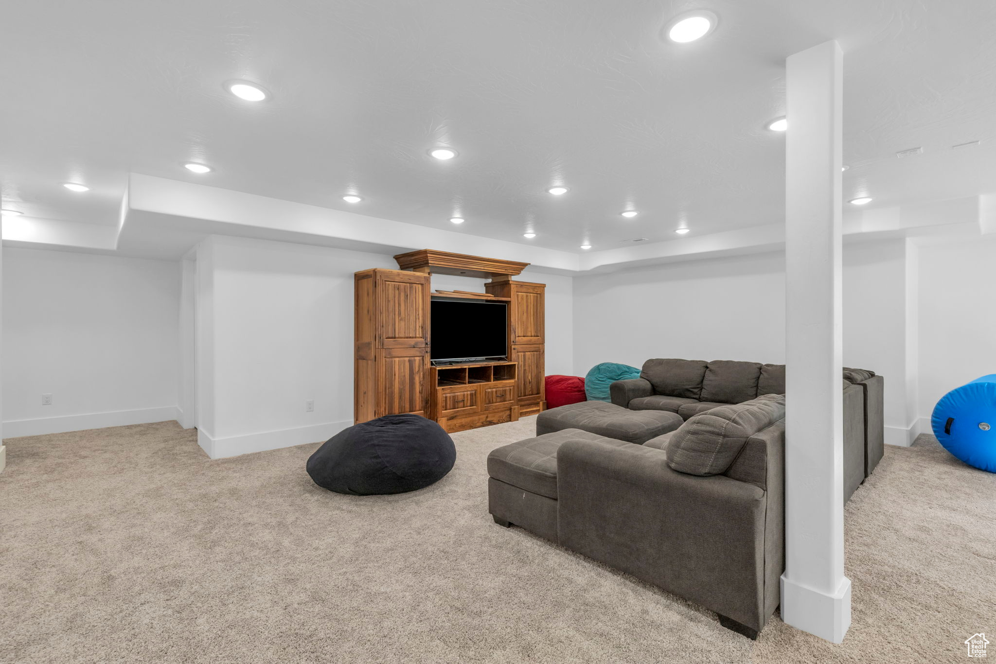 Living room featuring light carpet and wired for a theater system