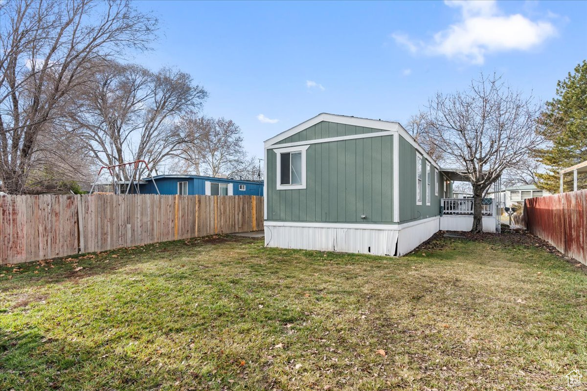 View of shed / structure with a yard