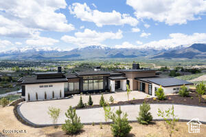 Prairie-style home with a mountain view