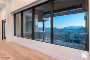 Room details with wood-type flooring and a mountain view