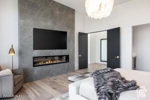 Living room featuring hardwood / wood-style flooring and a fireplace