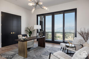 Office area with an inviting chandelier