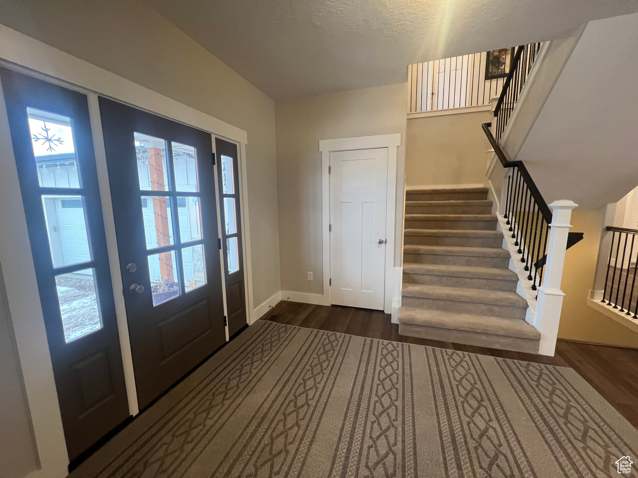 Foyer featuring dark hardwood / wood-style floors