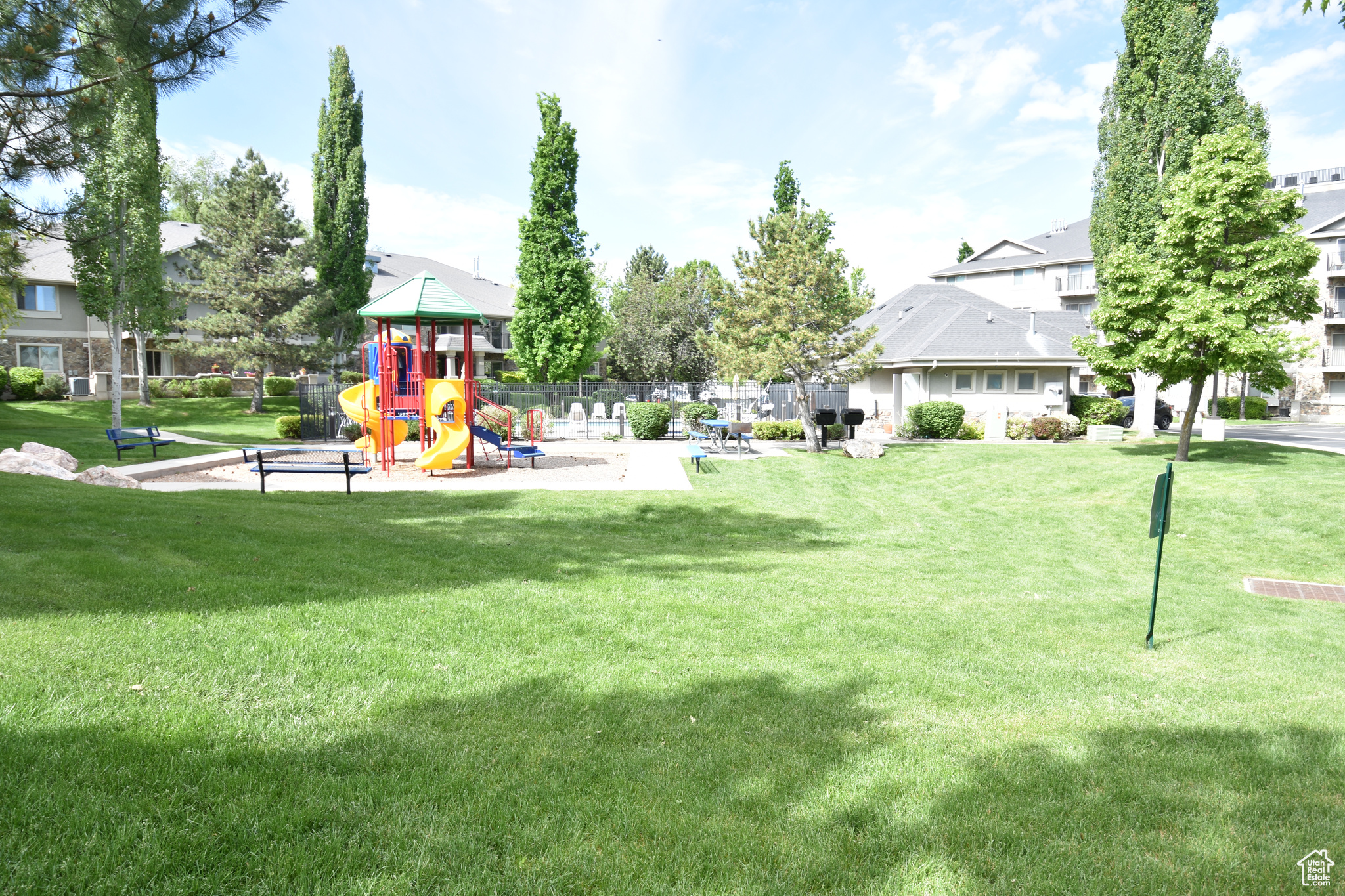 View of yard featuring a playground