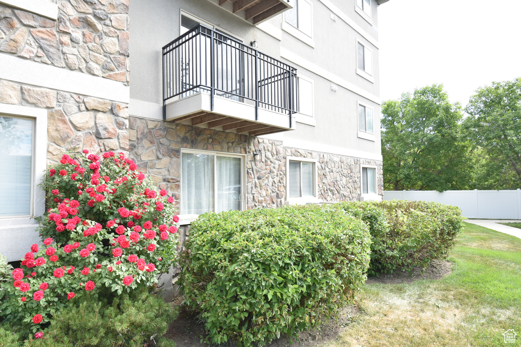 Doorway to property with a balcony