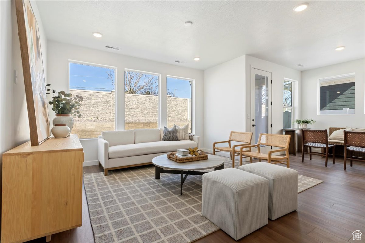 Living room with hardwood / wood-style floors